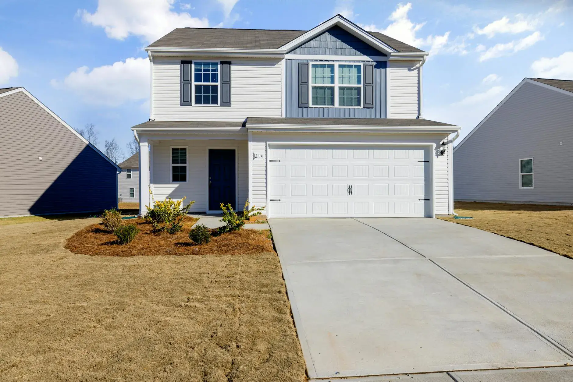 Professional garage door installation in Alabama - new door on residential home